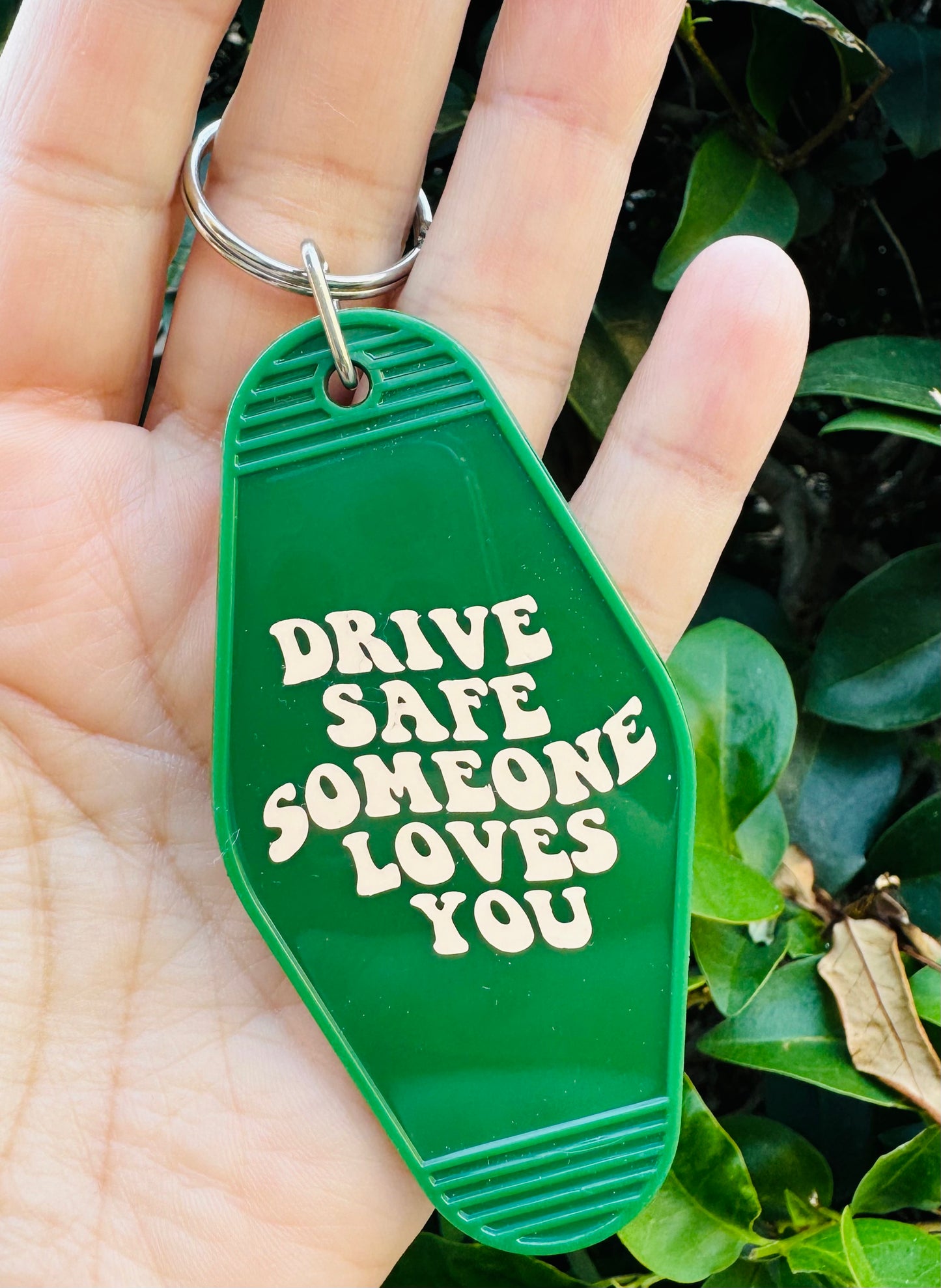 Green Motel Keychain drive safe somebody loves you