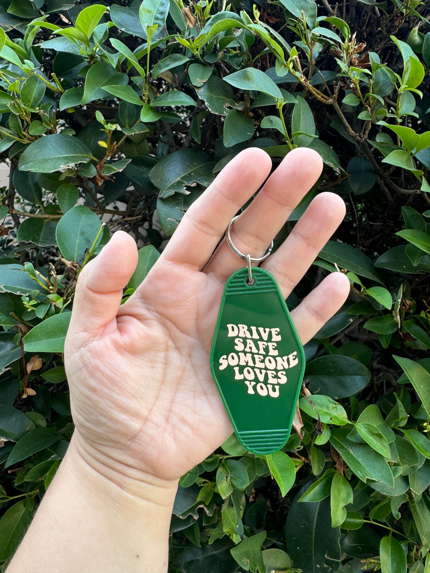 Green Motel Keychain drive safe somebody loves you